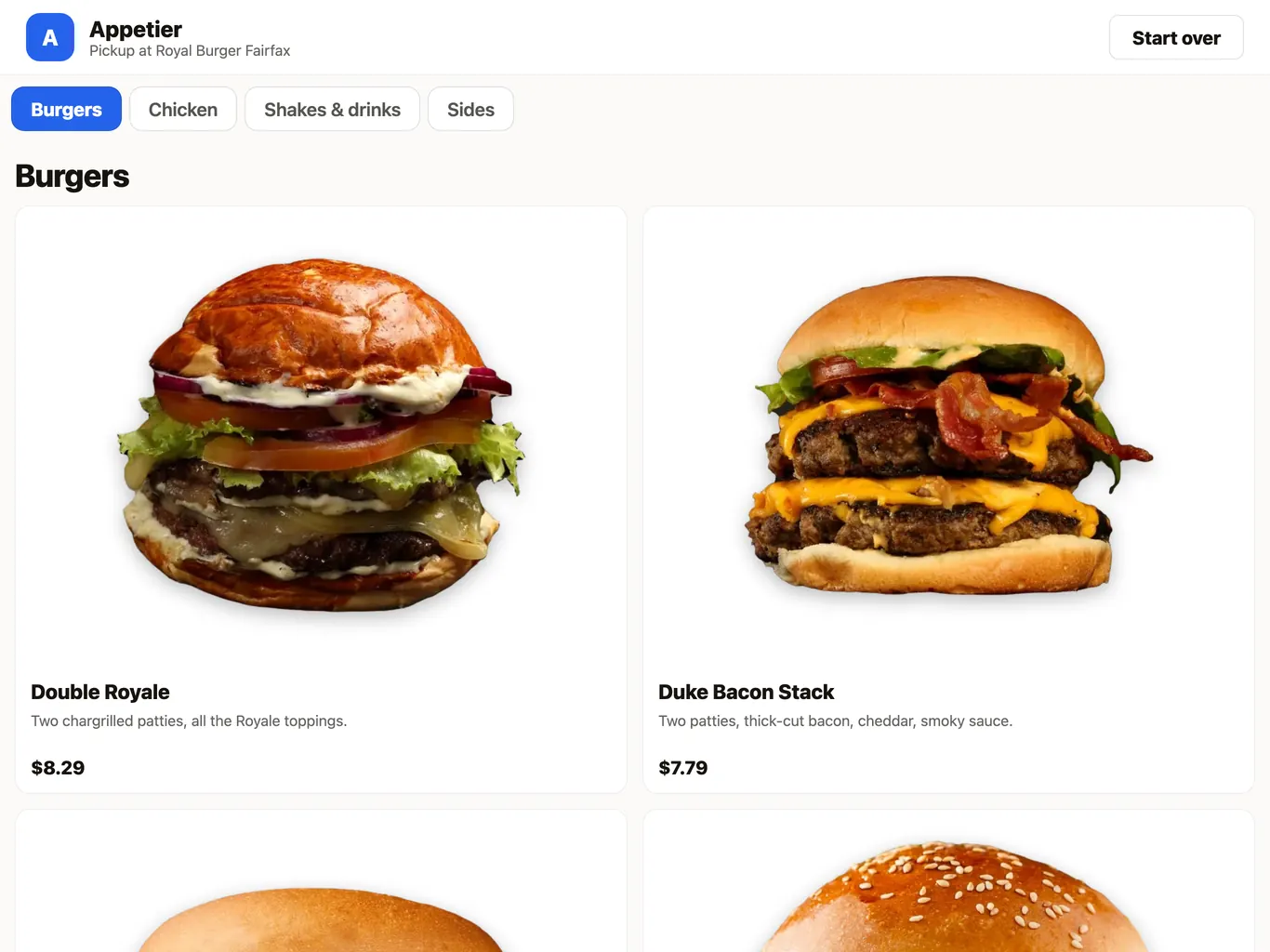 The self-order kiosk on a counter screen. A menu of burgers with large photos, prices, and a category bar across the top.